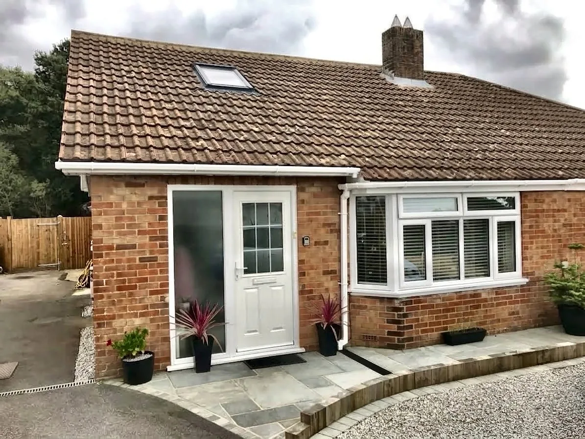 Completed front elevation with new entrance door